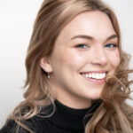 smiling female highly recommend